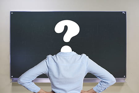 person looking at chalkboard with question mark for head thumbnail