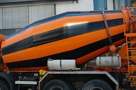 orange and black cement mixer truck thumbnail