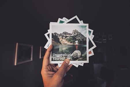 person holding cards thumbnail