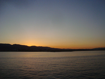 silhouette photography of body of water thumbnail