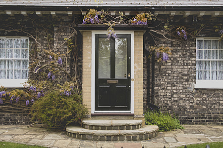 black wooden house door closed thumbnail