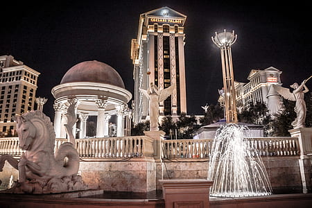 white water fountain near horse statue thumbnail
