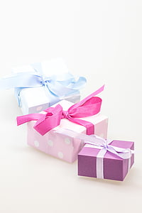 three assorted-color gift boxes thumbnail