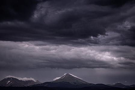 mountains under cloudy sky thumbnail