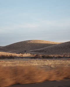 brown mountain under white sky thumbnail