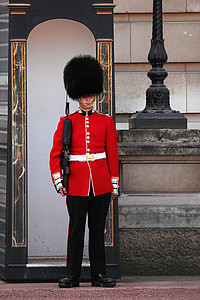 man standing in front of building thumbnail