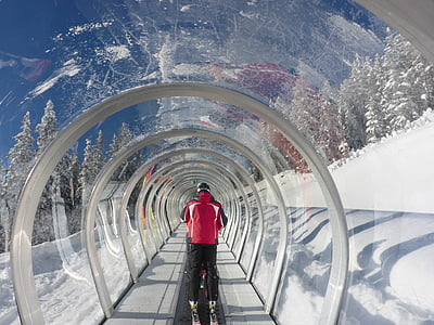 man in red jacket inside tunnel thumbnail