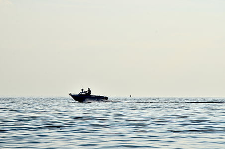 man sailing on sea at daytime thumbnail