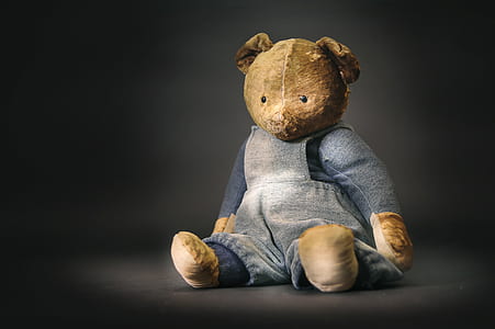 bear plush toy wearing gray long-sleeved dress thumbnail