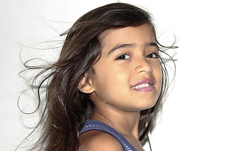 girl wearing grey and purple stripe top thumbnail