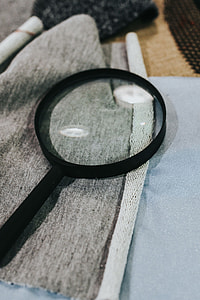 Magnifying glass with fabric on a table thumbnail