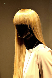 long blonde wig displayed on black mannequin thumbnail