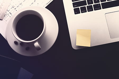 Work desk. Coffee, documents and laptop thumbnail