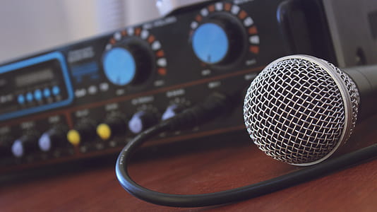 dynamic microphone beside amplifier thumbnail