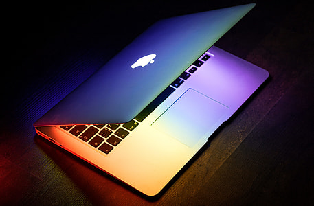 flat lay photography of turned on silver MacBook thumbnail