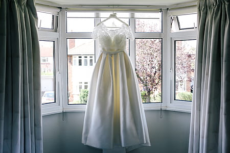 white wedding gown hanged on terrace thumbnail