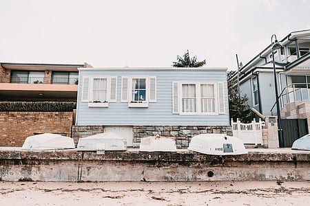 blue and white wooden house thumbnail