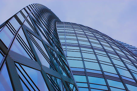 low angel photography of glass curtain building during daytime thumbnail