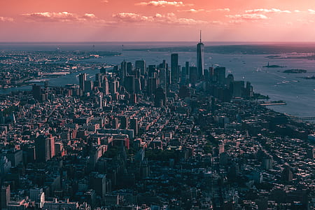 aerial photo of gray concrete buildings during daytime thumbnail