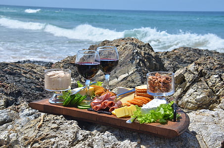 deesert beside glass of wine on tray thumbnail
