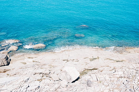 aerial photo of seashore during daytime thumbnail