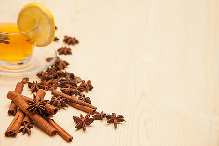 cinnamon sticks and star anise on table thumbnail