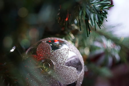 Silver Christmas Bauble Hanging on Christmas Tree thumbnail
