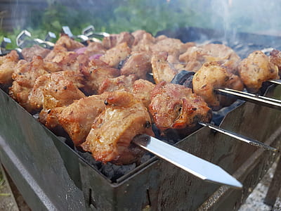 grilled barbeque on gray steel charcoal grill thumbnail