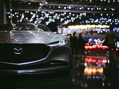selective focus photography of Mazda car thumbnail