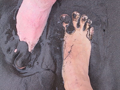 person's feet soaked at mud thumbnail