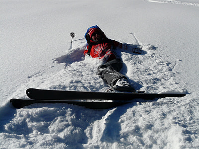 person lying on snow thumbnail