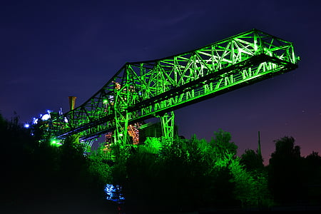 black and green bridge at nighttime thumbnail