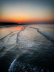 seashore taken during sunset thumbnail