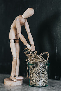 Wooden mannequin in various poses thumbnail