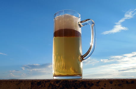 closeup photo of beer mug filled with beer thumbnail