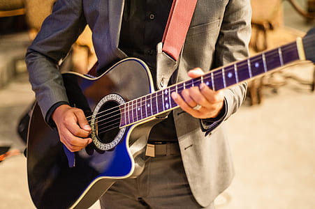 man playing acoustic guitar thumbnail