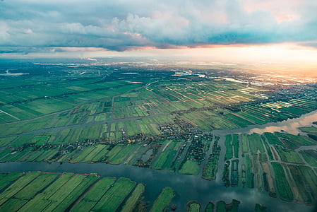 aerial photography of green field thumbnail