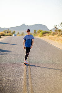 time lapse photography of man riding skateboard thumbnail