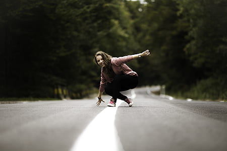woman touching concrete road thumbnail