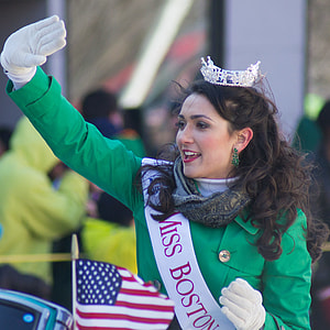 woman wearing Miss Boston Sash waving her right hand thumbnail