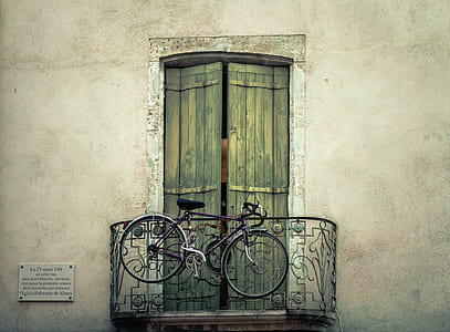 hanged bicycle on metal balustrade thumbnail