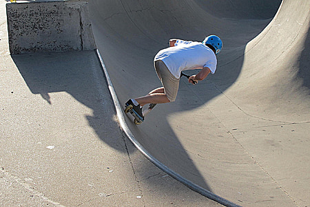man riding on skateboard thumbnail