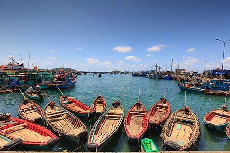 boats on body of water during daytime thumbnail
