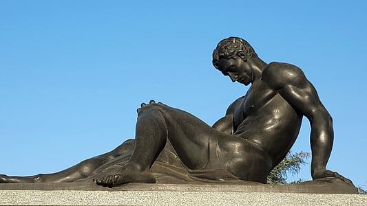 close-up of half-naked man statue thumbnail