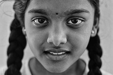 grayscale photography of girl hile smiling thumbnail