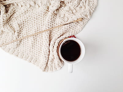 white mug filled with black liquid substance thumbnail