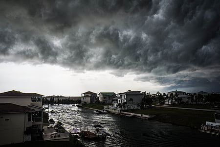 grayscale photo of houses during daytime thumbnail