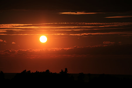 focus photography of sun surrounded by clouds thumbnail