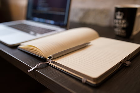 shallow focus of diary and pen thumbnail