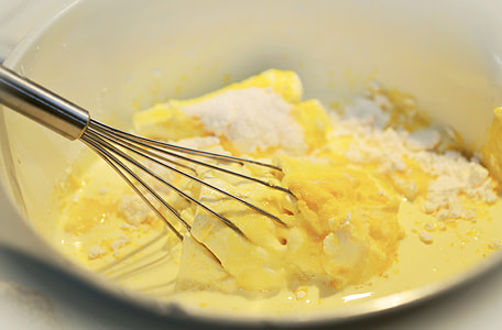 flour and cream with whisk on bowl thumbnail